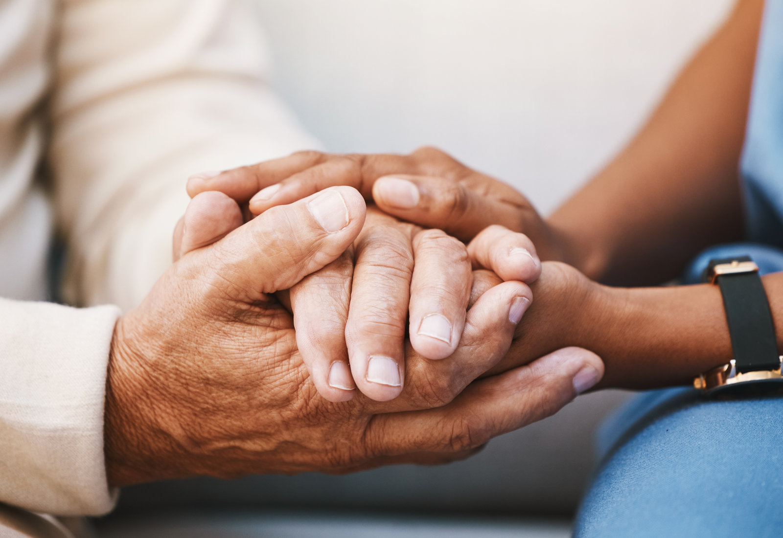 Hands held in comfort